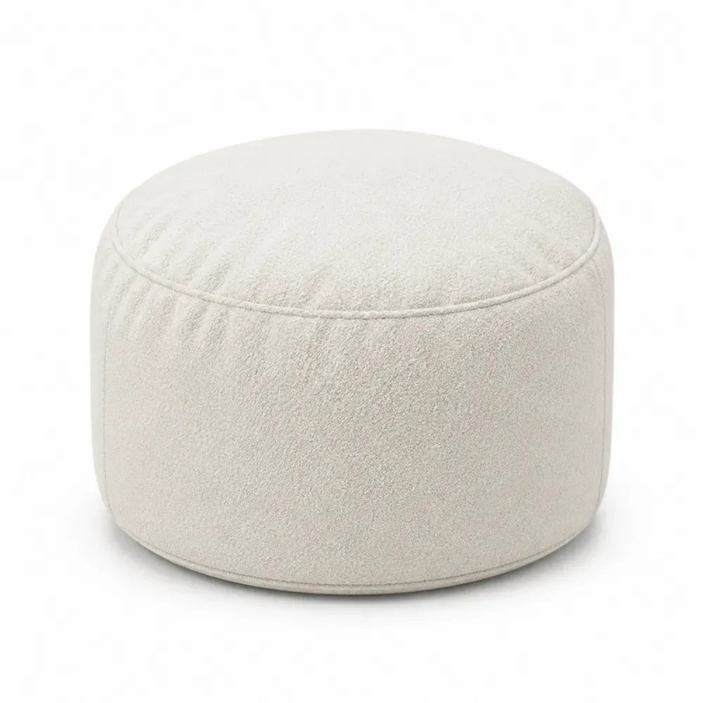 Puf tipo saco cilíndrico tapizado en tejido bouclé beige sin dimensiones especificadas