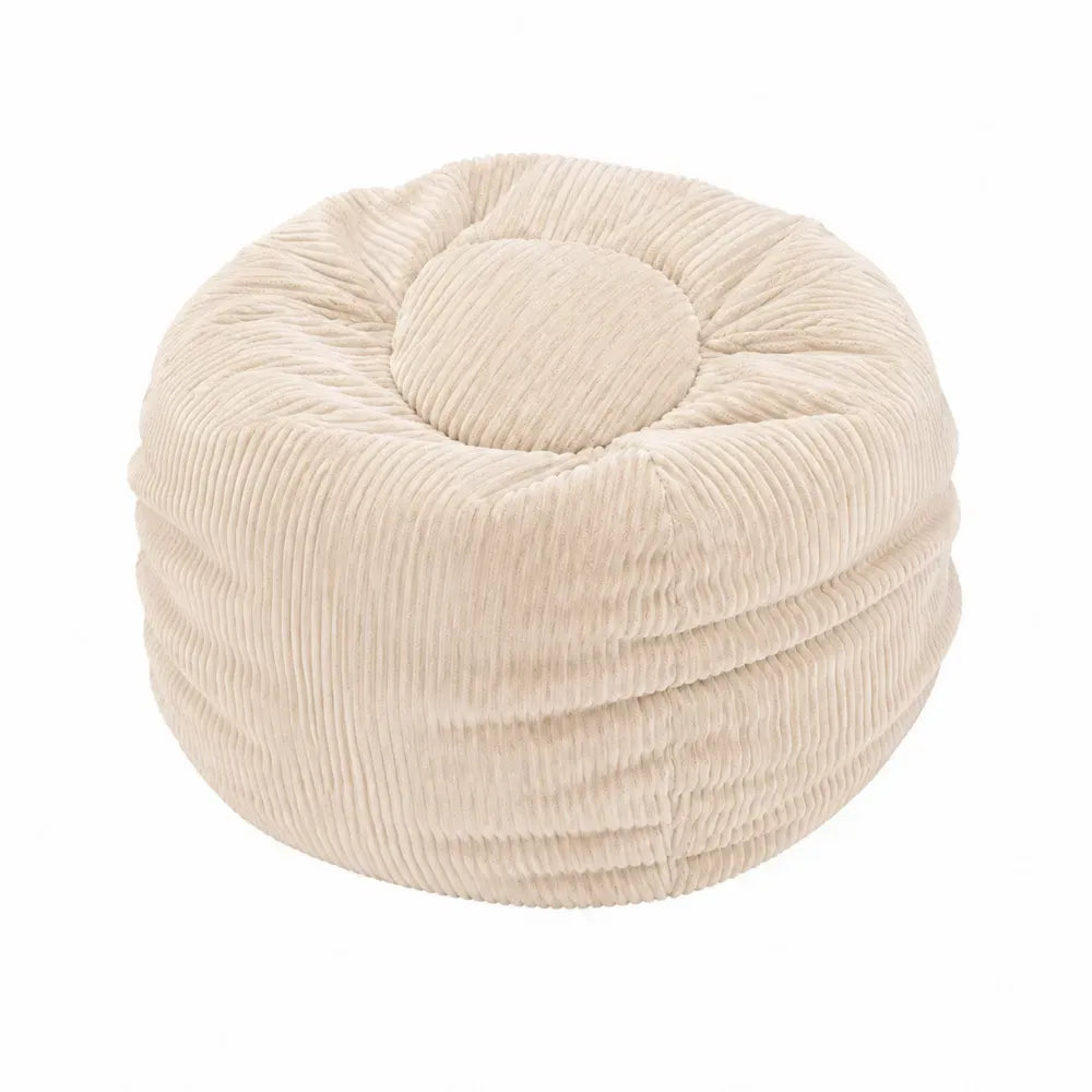 Puf redondo de 60 cm de diámetro y 40 cm de altura tapizado en tejido acanalado beige con relleno de espuma y fibra de poliéster